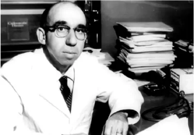 Black and white photograph of Stamler looking into the camera.